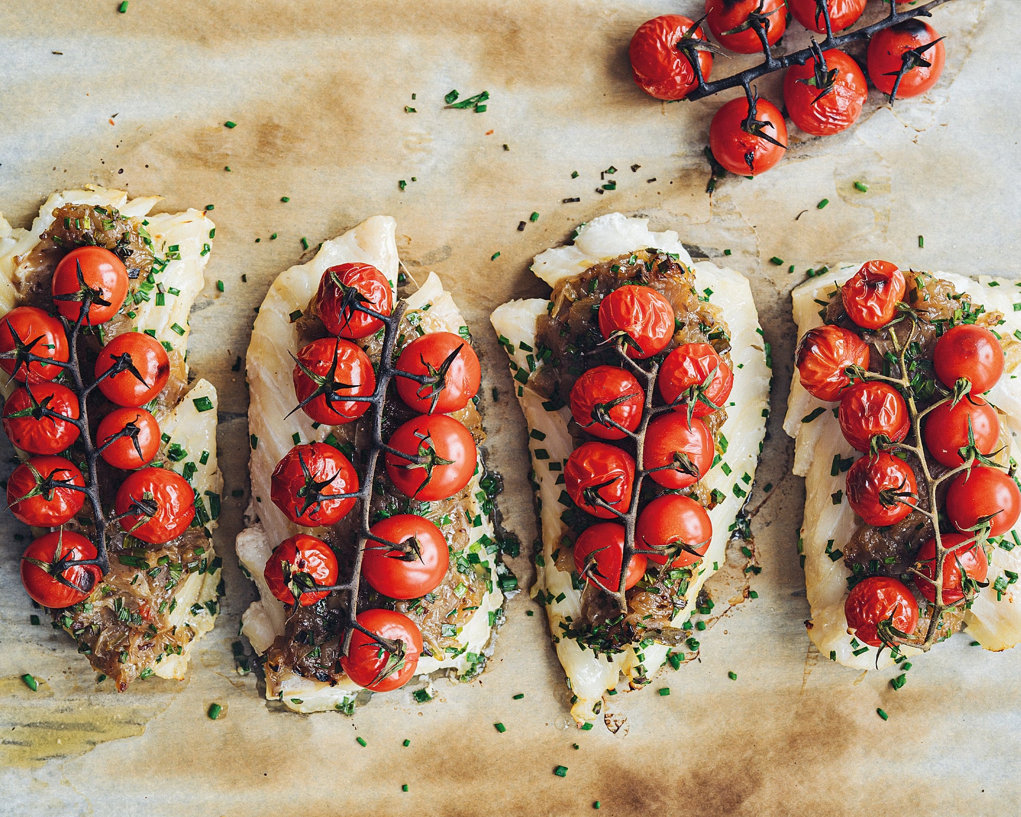 Filet de morue au confit d’oignons et tomates